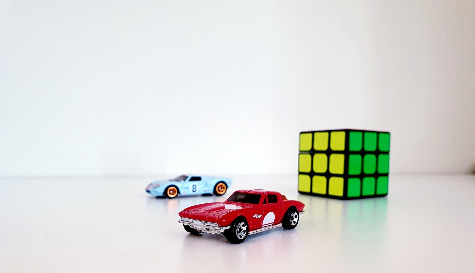 red and yellow car scale model