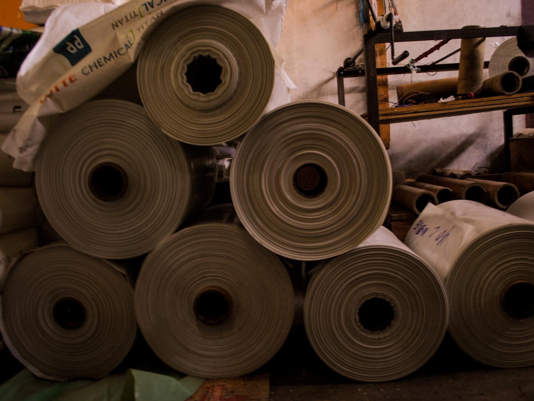 a pile of rolled up rolls of paper